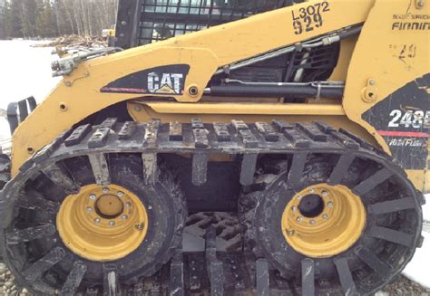 caterpillar skid steer winter tracks|aftermarket skid steer track kits.